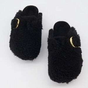 Birkenstock Black Fuzzy Mules with Gold Buckle